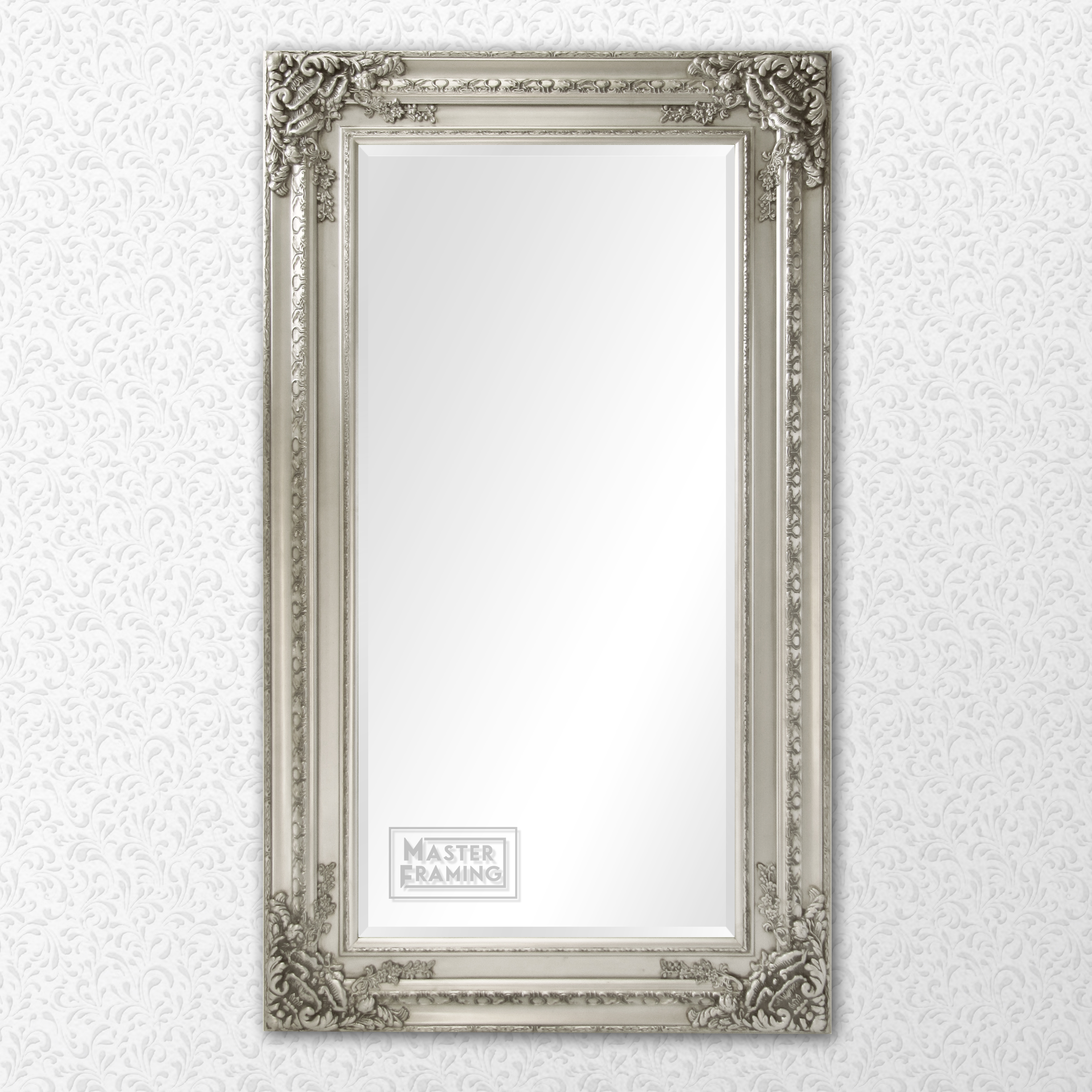 wide ornate silver framed mirror 1050s